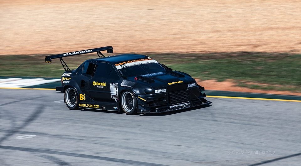 KSport-equipped competition car on track